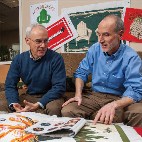 Henry (Left) and David (Right), founders of Chandler 4 Corners,  working on designs.