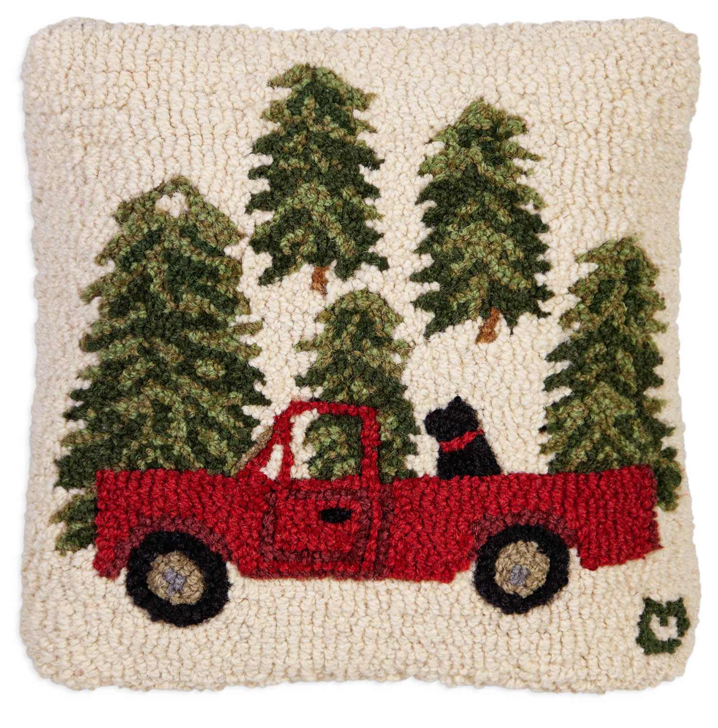Dog in red truck wool pillow.